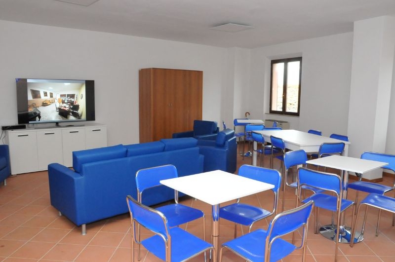 alloggi in sostituzione SAE presso Palazzo Magnalbò, Rotella: sala comune